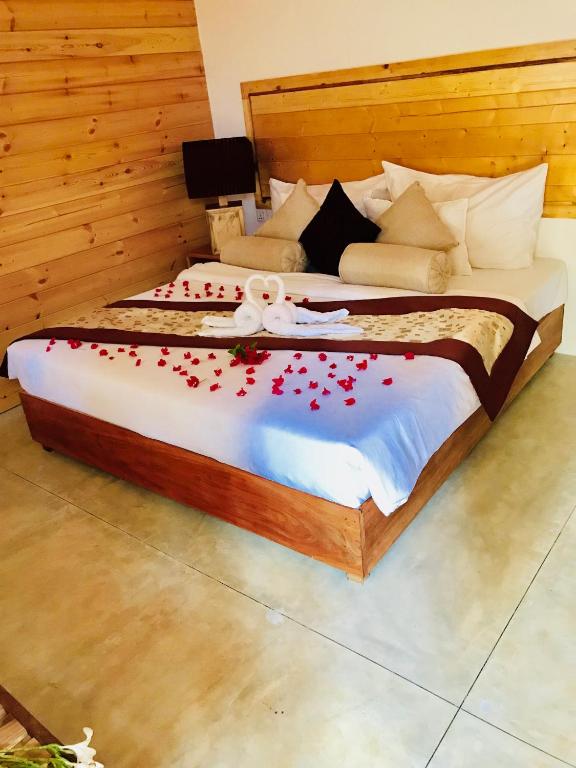 Postel nebo postele na pokoji v ubytování Trinco Relax Hut