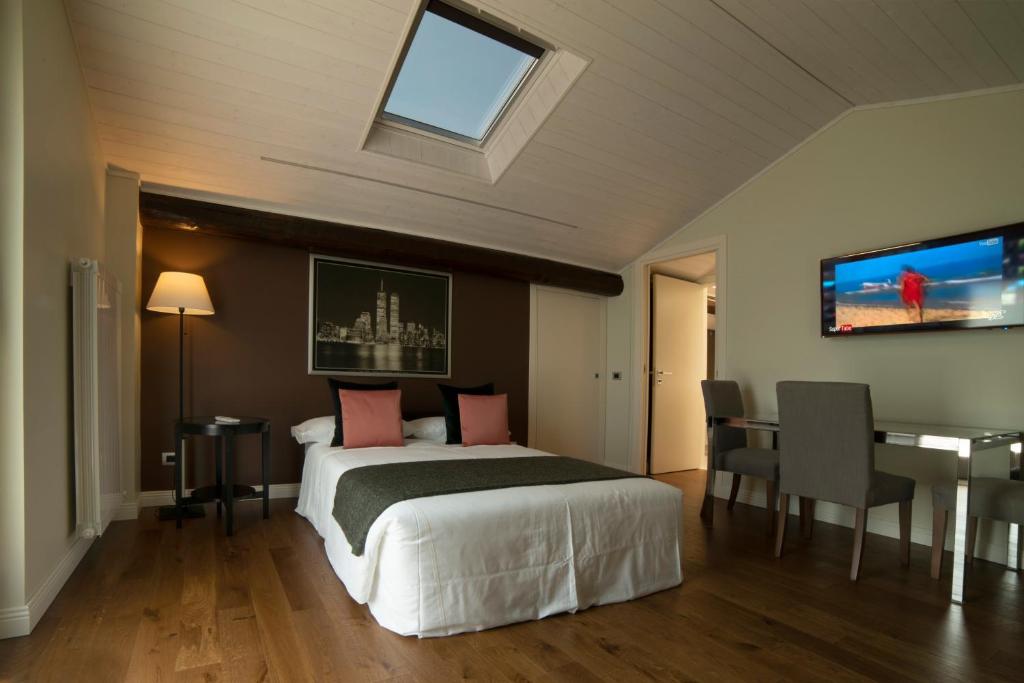 Telewizja i/lub zestaw kina domowego w obiekcie Cascina36 B&B