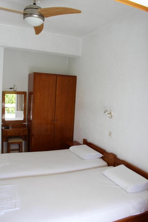 Postel nebo postele na pokoji v ubytování Villa Angela