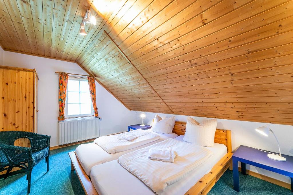 Postel nebo postele na pokoji v ubytování Müritzparadies