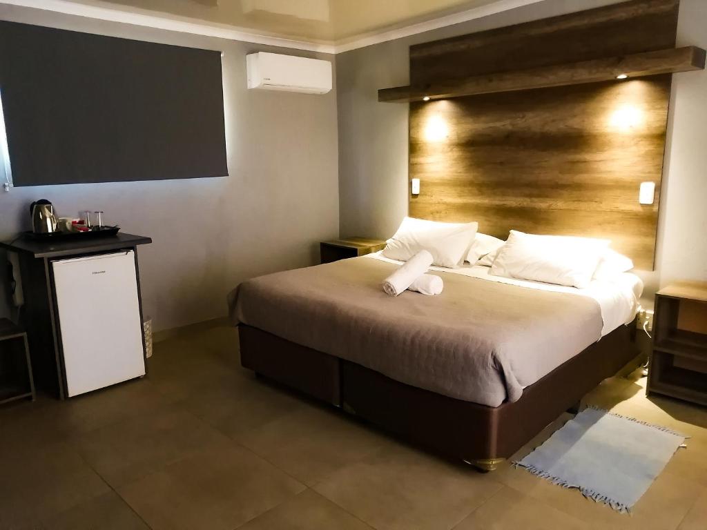 Tempat tidur dalam kamar di Goedehoop Guesthouse