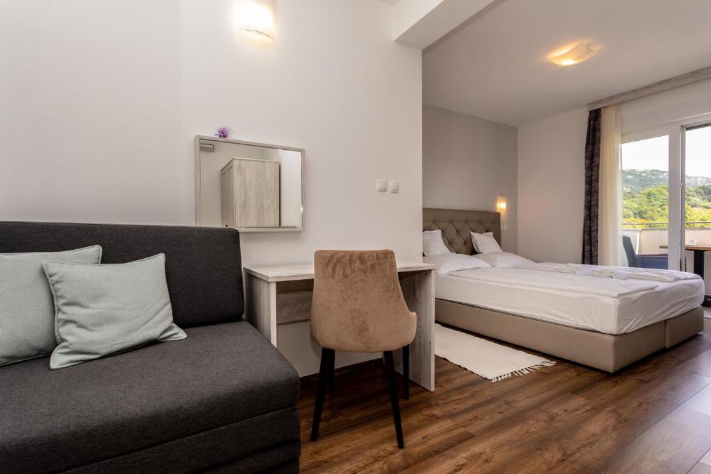 Łóżko lub łóżka w pokoju w obiekcie Bed & Breakfast Došen V