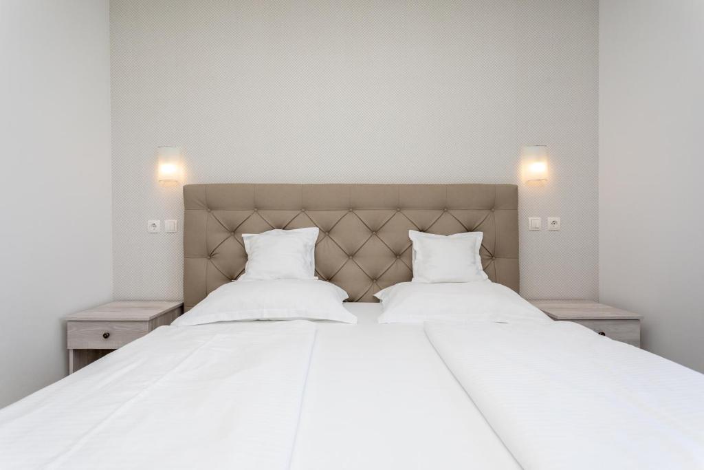 Łóżko lub łóżka w pokoju w obiekcie Bed & Breakfast Došen V