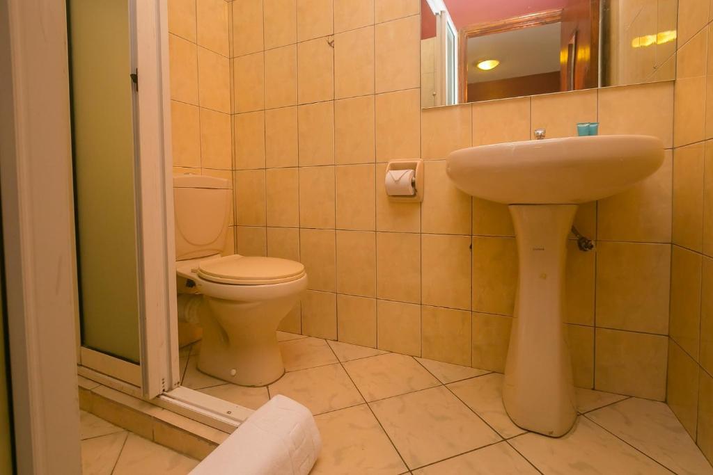 Koupelna v ubytování Plus254 Hotel