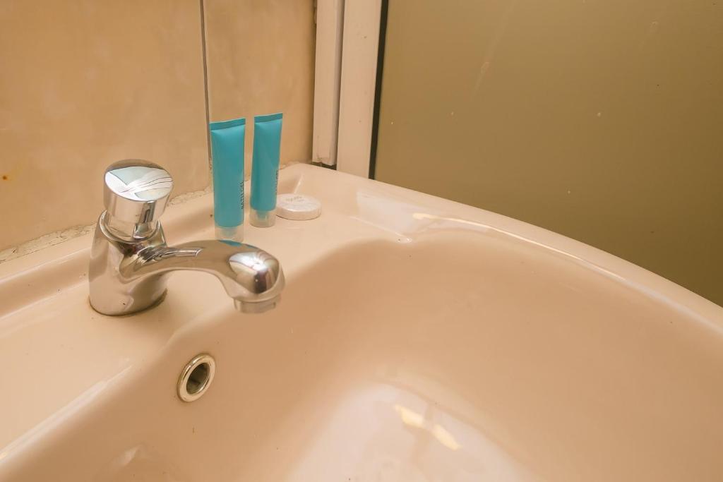 Koupelna v ubytování Plus254 Hotel