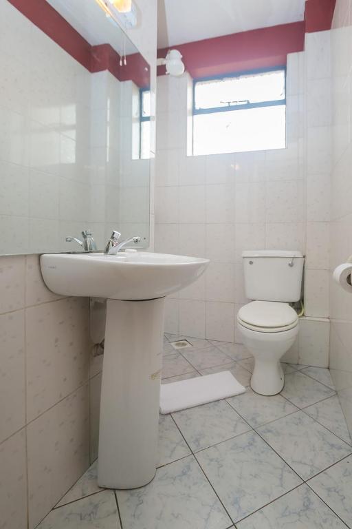 Koupelna v ubytování Plus254 Hotel