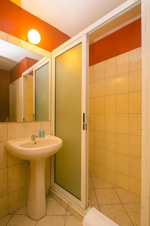 Koupelna v ubytování Plus254 Hotel