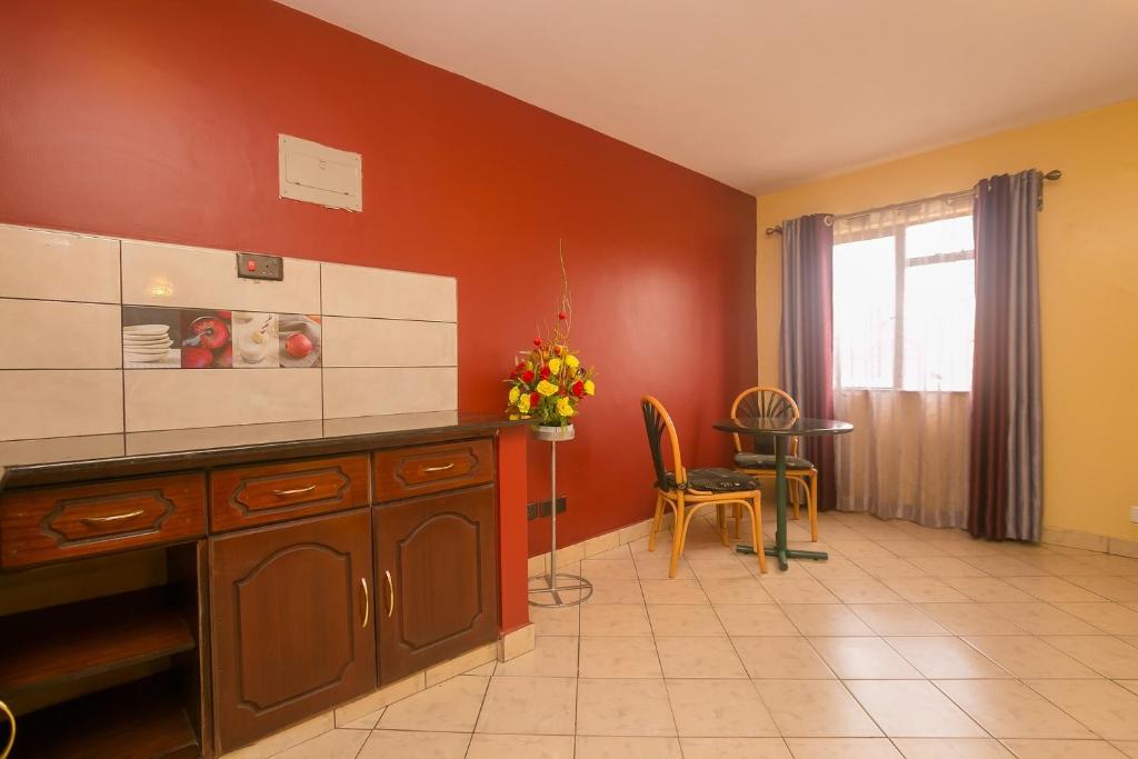 Kuchyň nebo kuchyňský kout v ubytování Plus254 Hotel