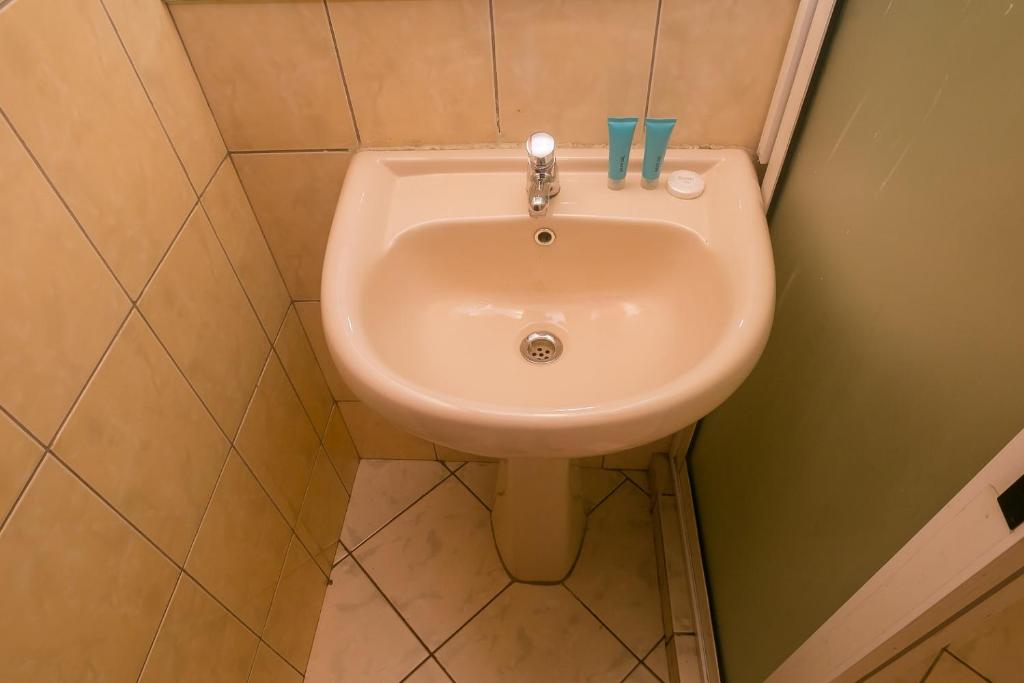 Koupelna v ubytování Plus254 Hotel