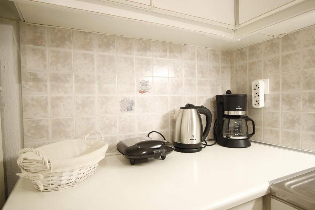 Zestaw do parzenia kawy i herbaty w obiekcie Comfortable Apartment with Garden - Casa con Vista
