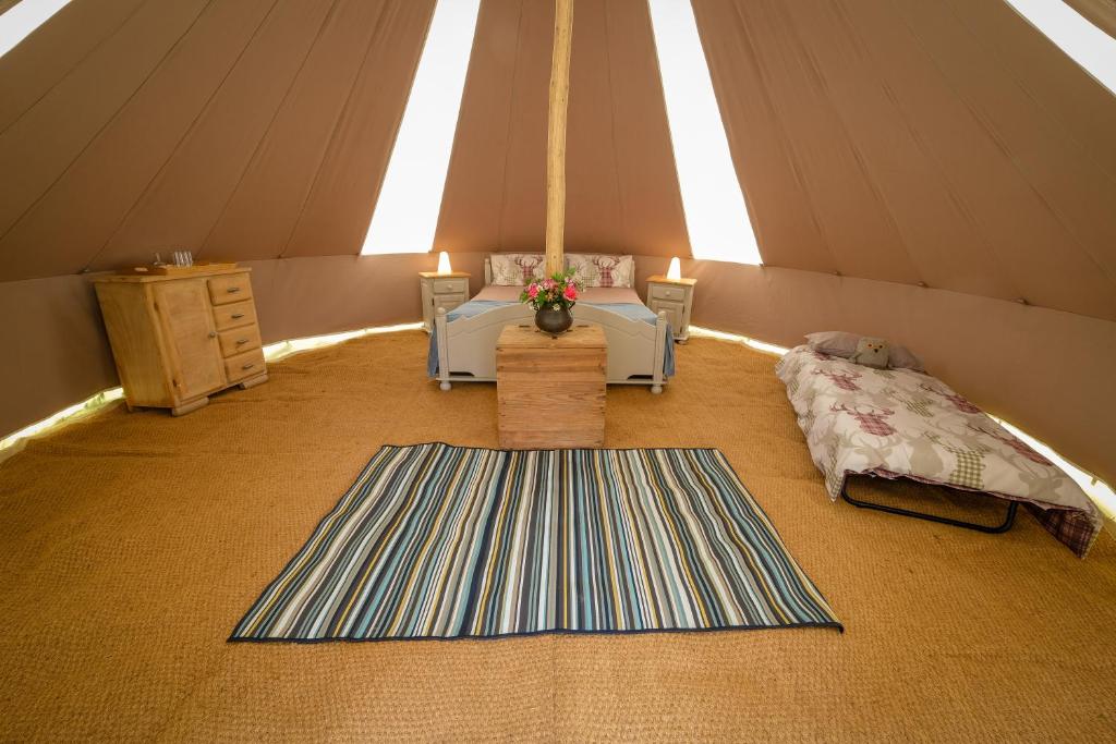 Posezení v ubytování Cool Under Canvas