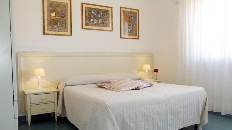 Postel nebo postele na pokoji v ubytování La Rosada