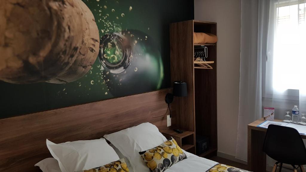 Postel nebo postele na pokoji v ubytování Hotel de Champagne