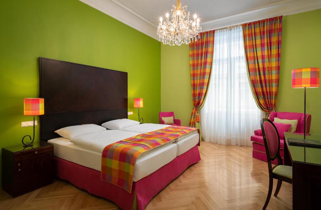Postel nebo postele na pokoji v ubytování Appartement-Hotel an der Riemergasse