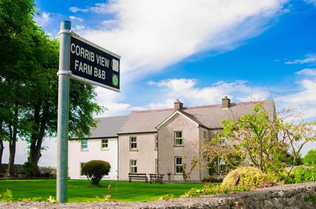 a street sign in front of a house at Corrib View Farmhouse in Galway