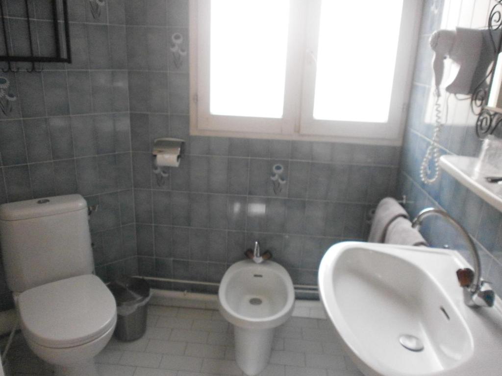 Koupelna v ubytování Hôtel Maya