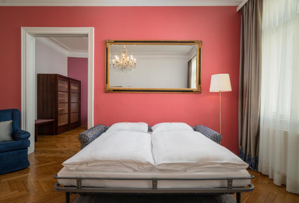 Postel nebo postele na pokoji v ubytování Appartement-Hotel an der Riemergasse