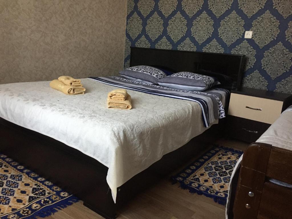 Postel nebo postele na pokoji v ubytování Guest House Loza