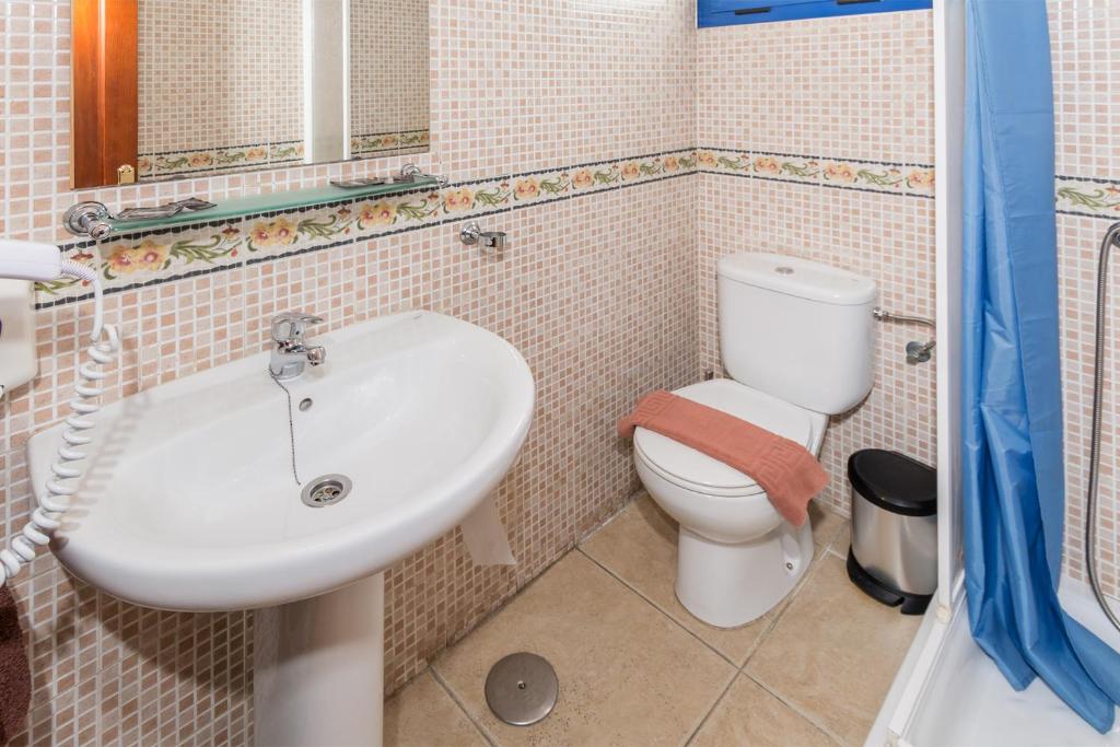 Koupelna v ubytování Hostal Magec
