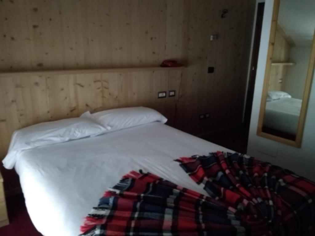 Postel nebo postele na pokoji v ubytování Hotel Derby
