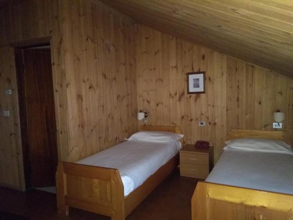 Postel nebo postele na pokoji v ubytování Hotel Derby