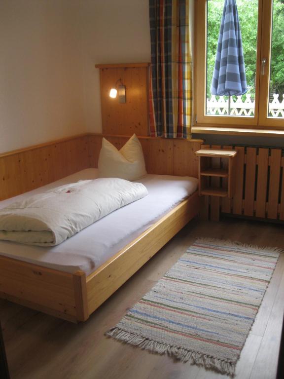 Postel nebo postele na pokoji v ubytování Ferienhaus Stoanerhof