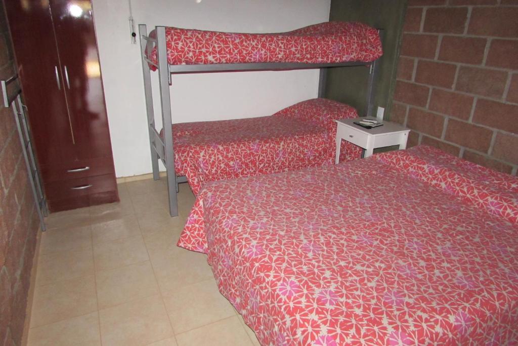 Postel nebo postele na pokoji v ubytování Cabaña en Belén