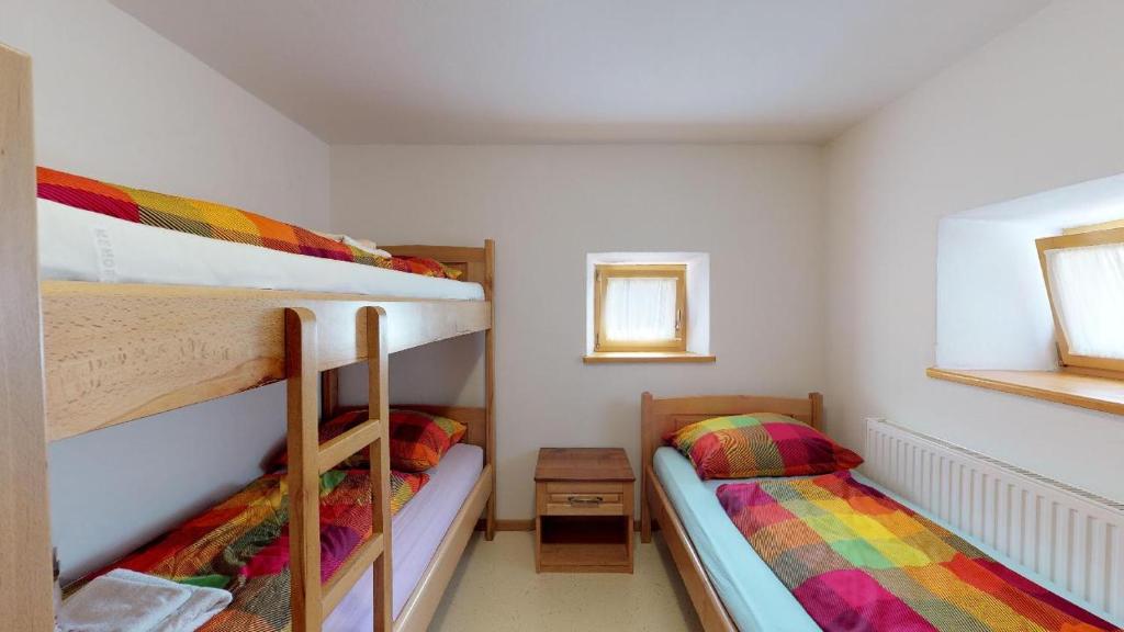 Postel nebo postele na pokoji v ubytování Apartmaji pri Marodnu