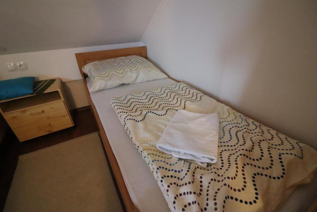 Postel nebo postele na pokoji v ubytování Pod Orehi Guest House