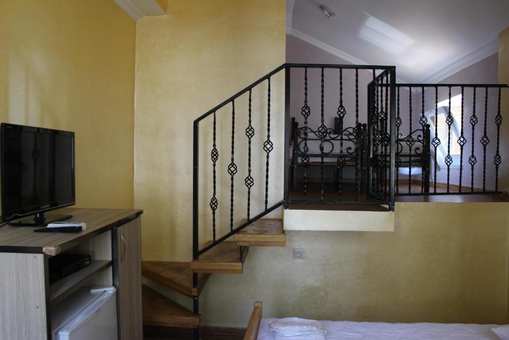 Postel nebo postele na pokoji v ubytování Hotel Evrazia
