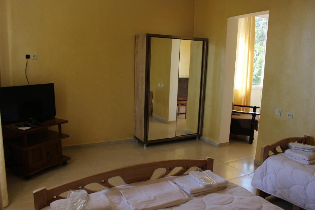 Postel nebo postele na pokoji v ubytování Hotel Evrazia