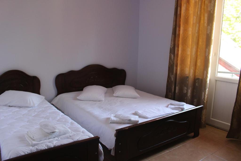 Postel nebo postele na pokoji v ubytování Hotel Evrazia