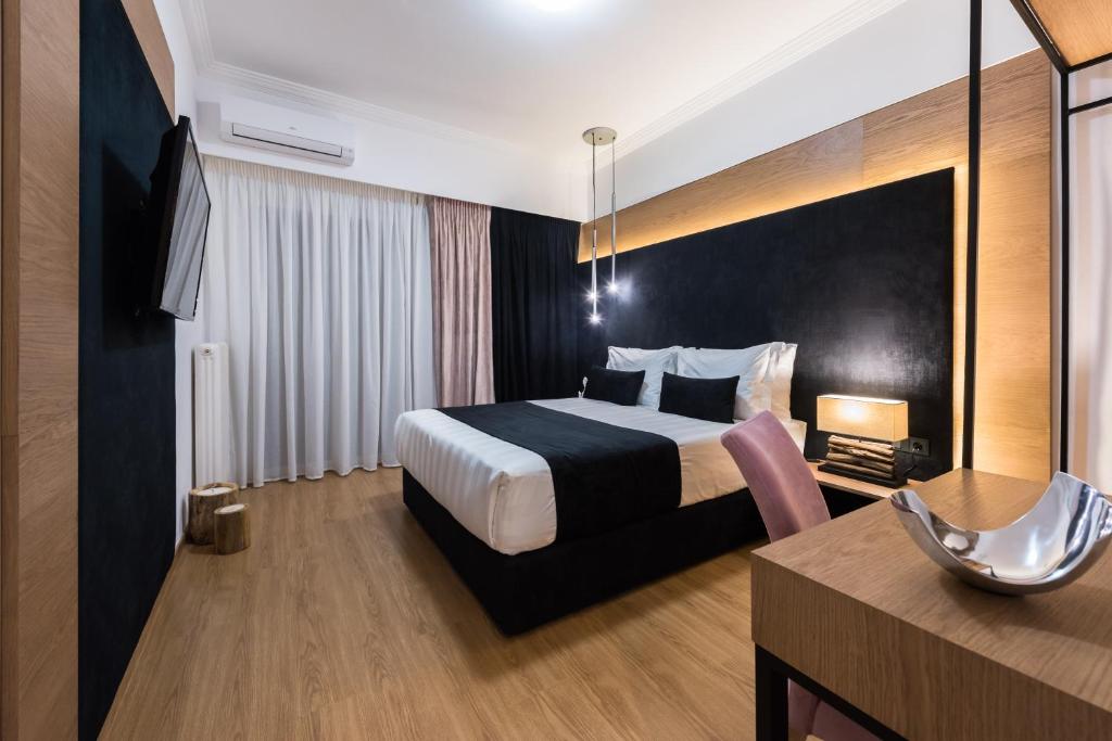 Posteľ alebo postele v izbe v ubytovaní Acropolis View Deluxe Penthouse & Luxury Apartments