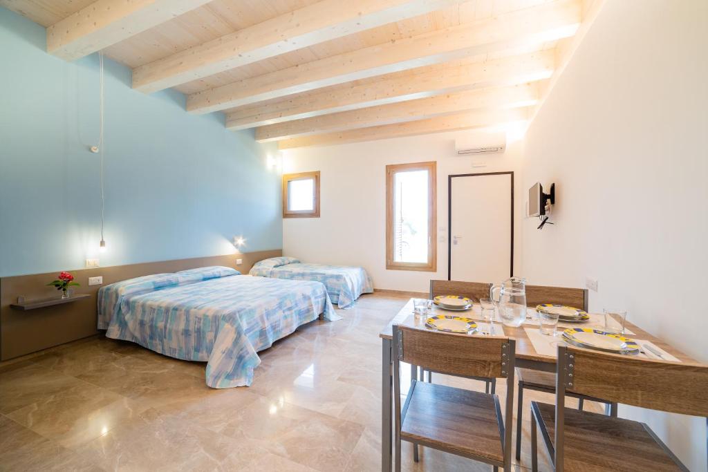 Posteľ alebo postele v izbe v ubytovaní Agriturismo Acquachiara