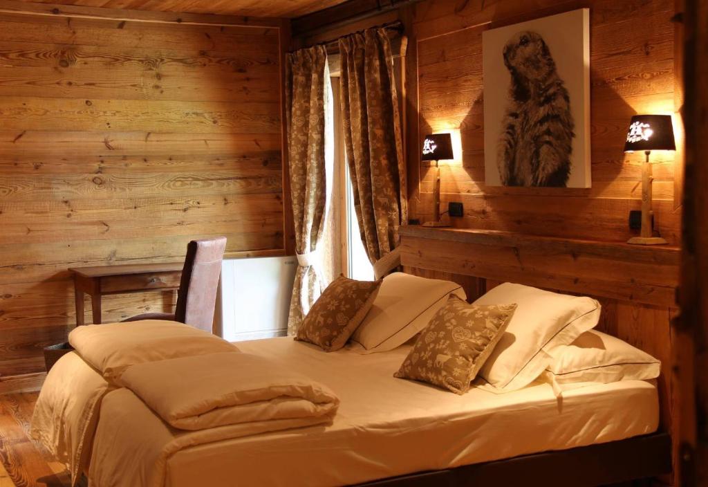 Postel nebo postele na pokoji v ubytování Les Trompeurs chez Odette