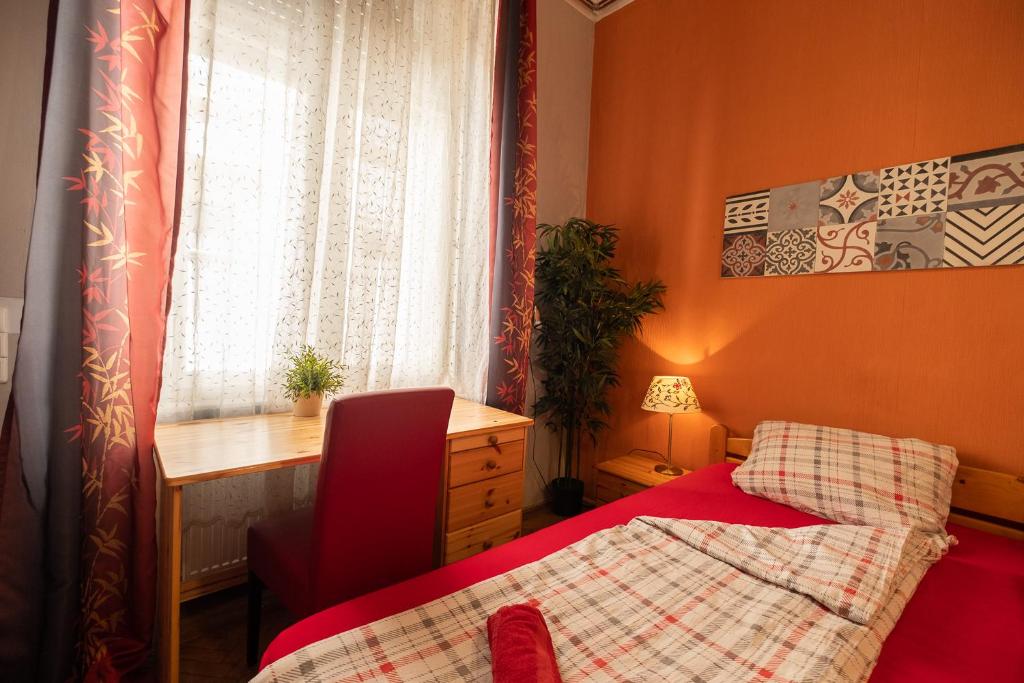 Postel nebo postele na pokoji v ubytování Pesto Hostel