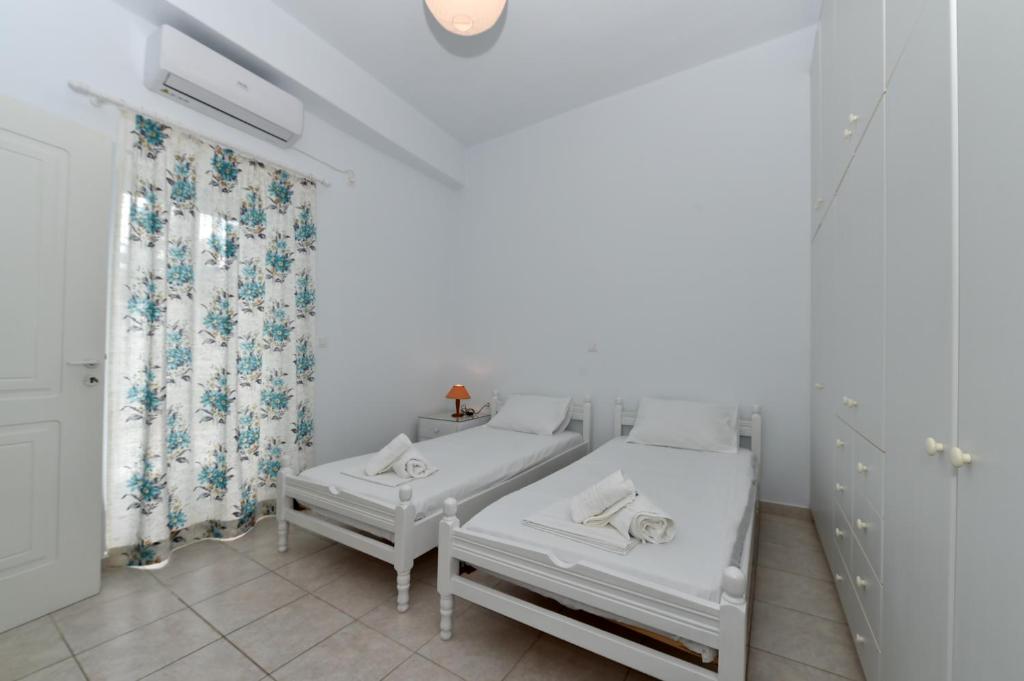 Posteľ alebo postele v izbe v ubytovaní Marina's Home