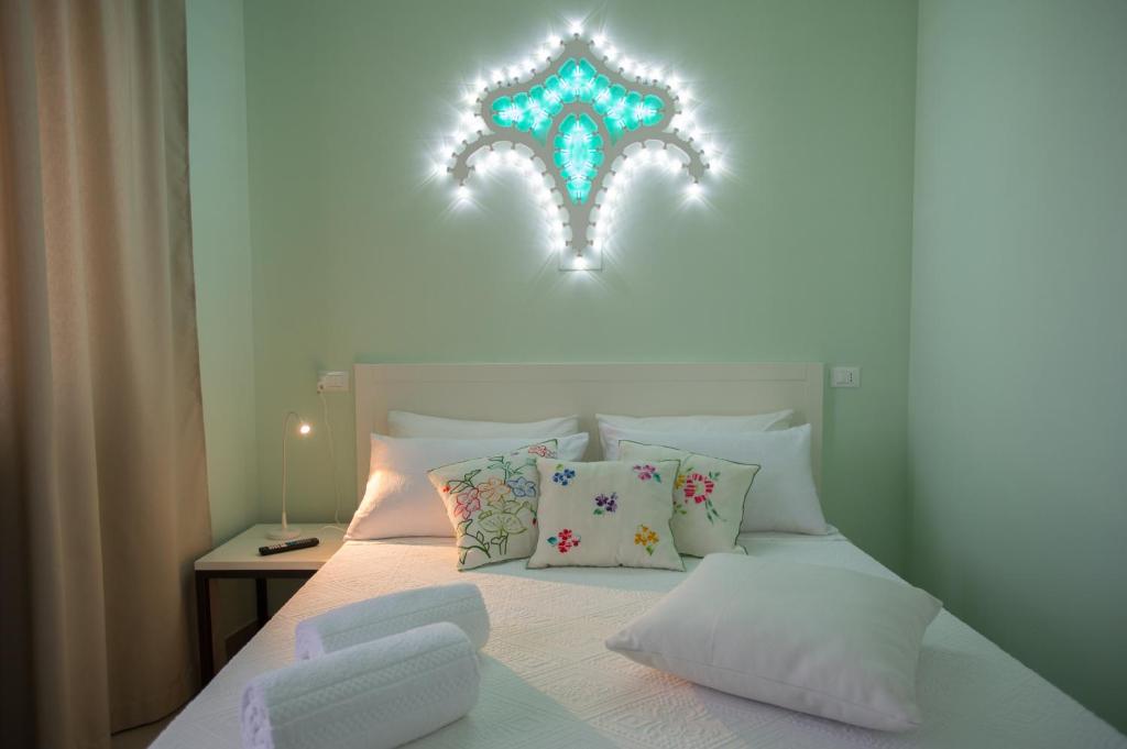 Posteľ alebo postele v izbe v ubytovaní Luci del Salento Guest House
