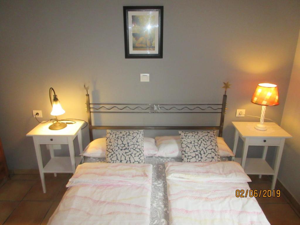 Postel nebo postele na pokoji v ubytování La Muria Apartment