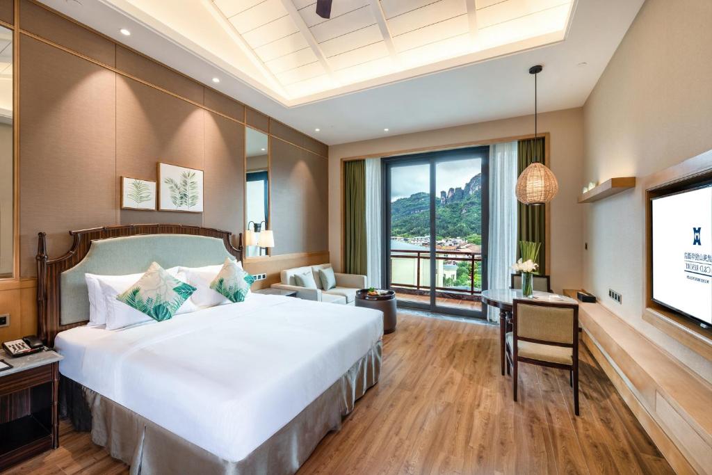 Postel nebo postele na pokoji v ubytování C&D Resort,Wuyi Mountain