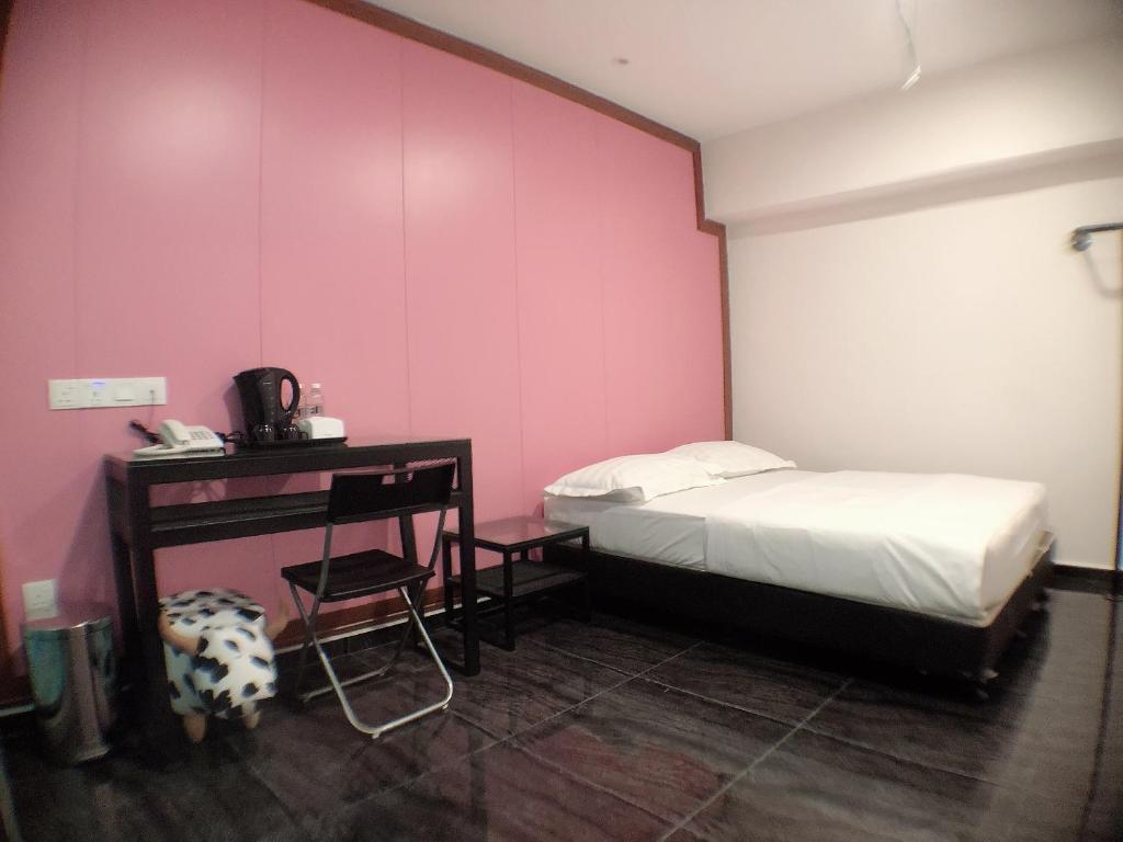 Postel nebo postele na pokoji v ubytování M Design Hotel @ Taman Pertama