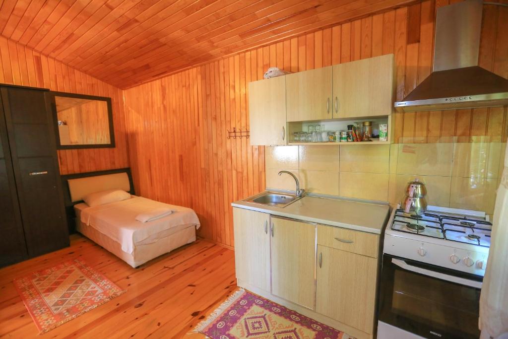 Kuchyň nebo kuchyňský kout v ubytování Cinderella Pension & Bungalow