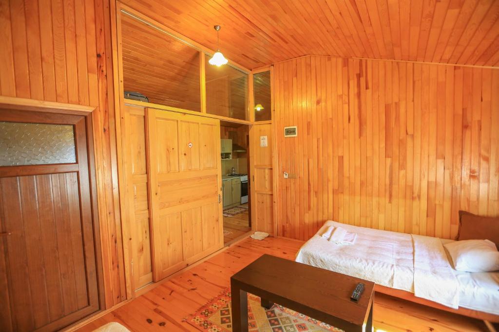 Postel nebo postele na pokoji v ubytování Cinderella Pension & Bungalow