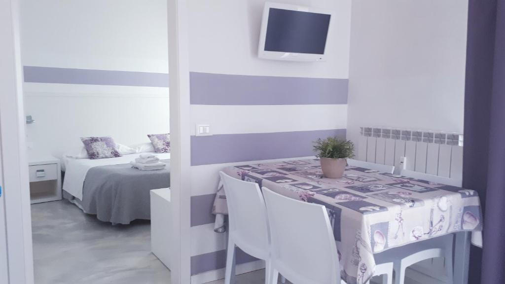Posteľ alebo postele v izbe v ubytovaní Minisuite