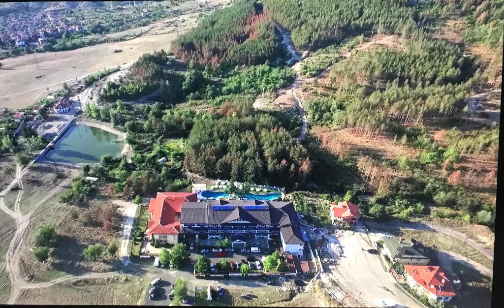 an aerial view of a house on a mountain at Hotel Konak in Momchilgrad