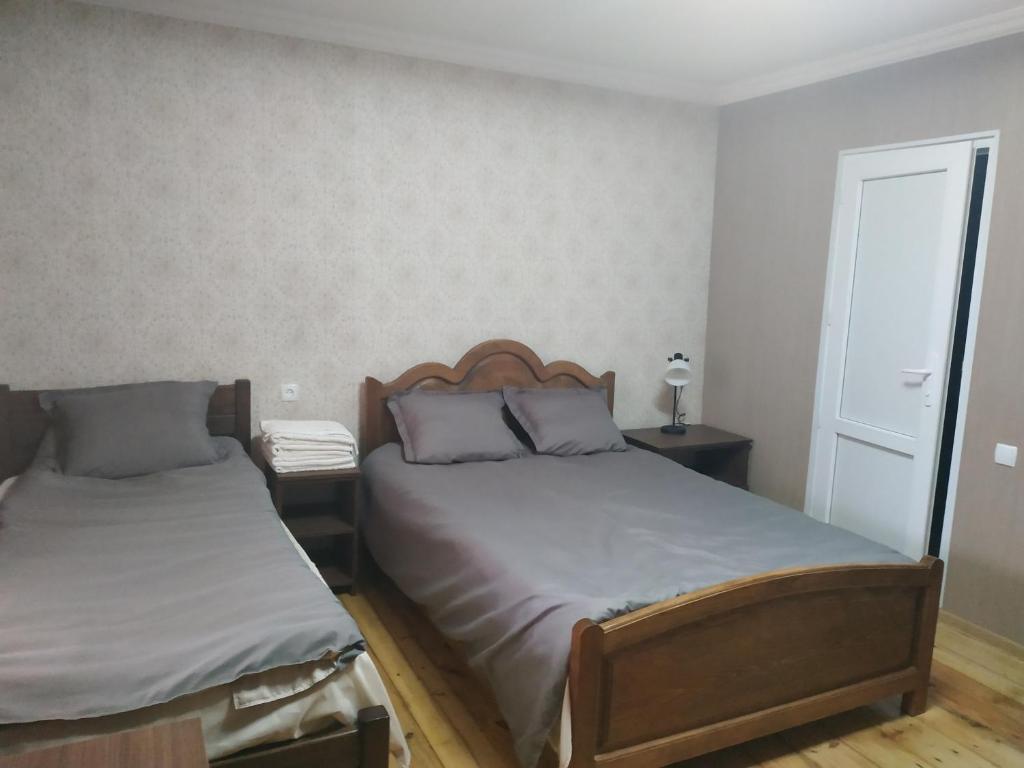 Postel nebo postele na pokoji v ubytování Mount Guest