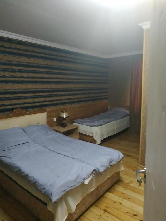 Postel nebo postele na pokoji v ubytování Mount Guest