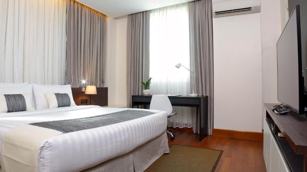 Postel nebo postele na pokoji v ubytování Residence26