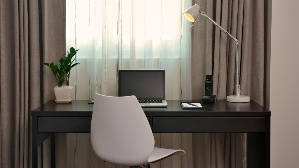 TV a/nebo společenská místnost v ubytování Residence26
