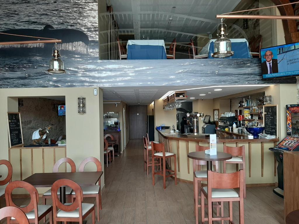 A restaurant or other place to eat at Hotel Boutique O Náutico Laxe